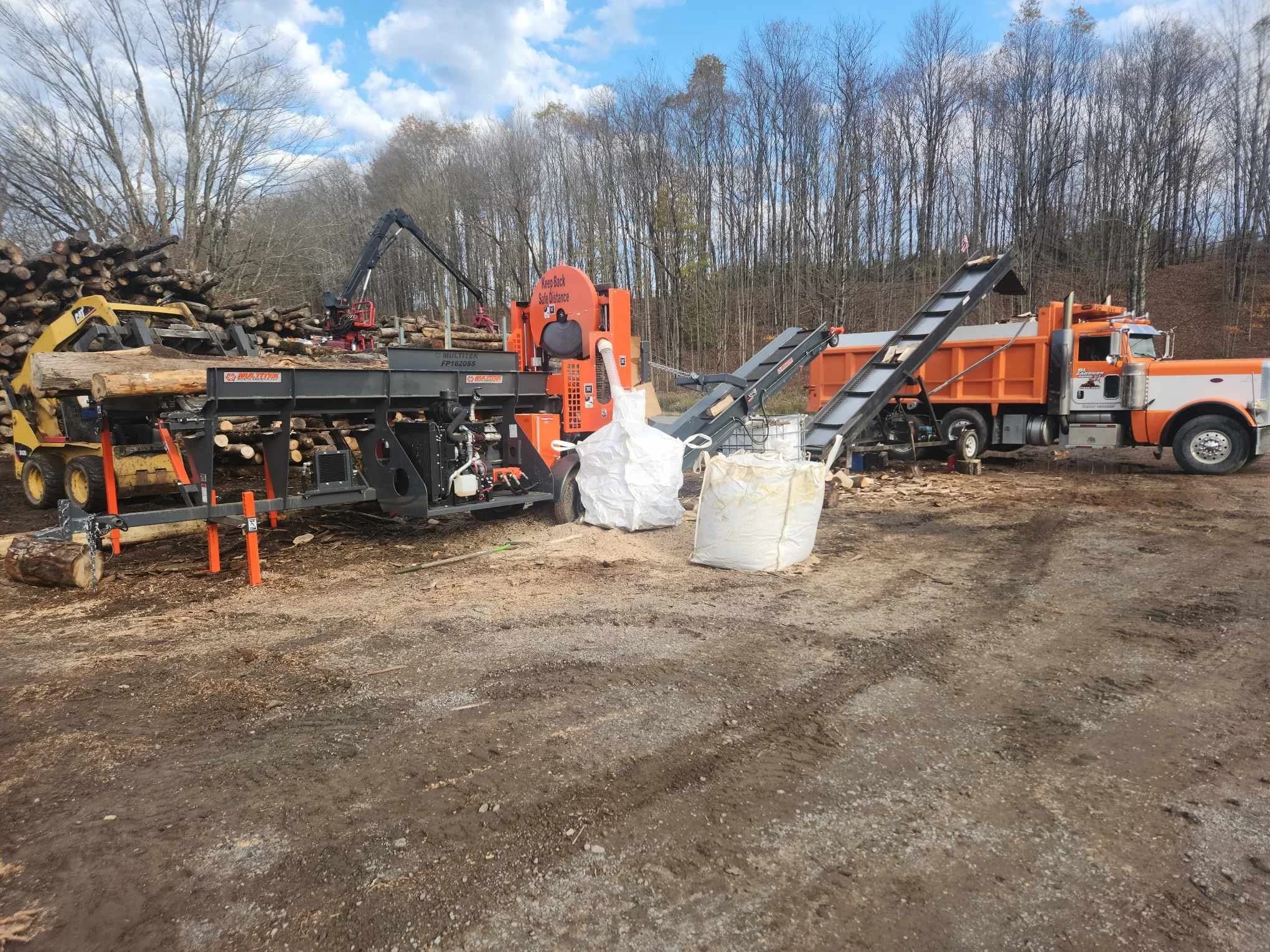 The Multitek firewood processor running in the yard