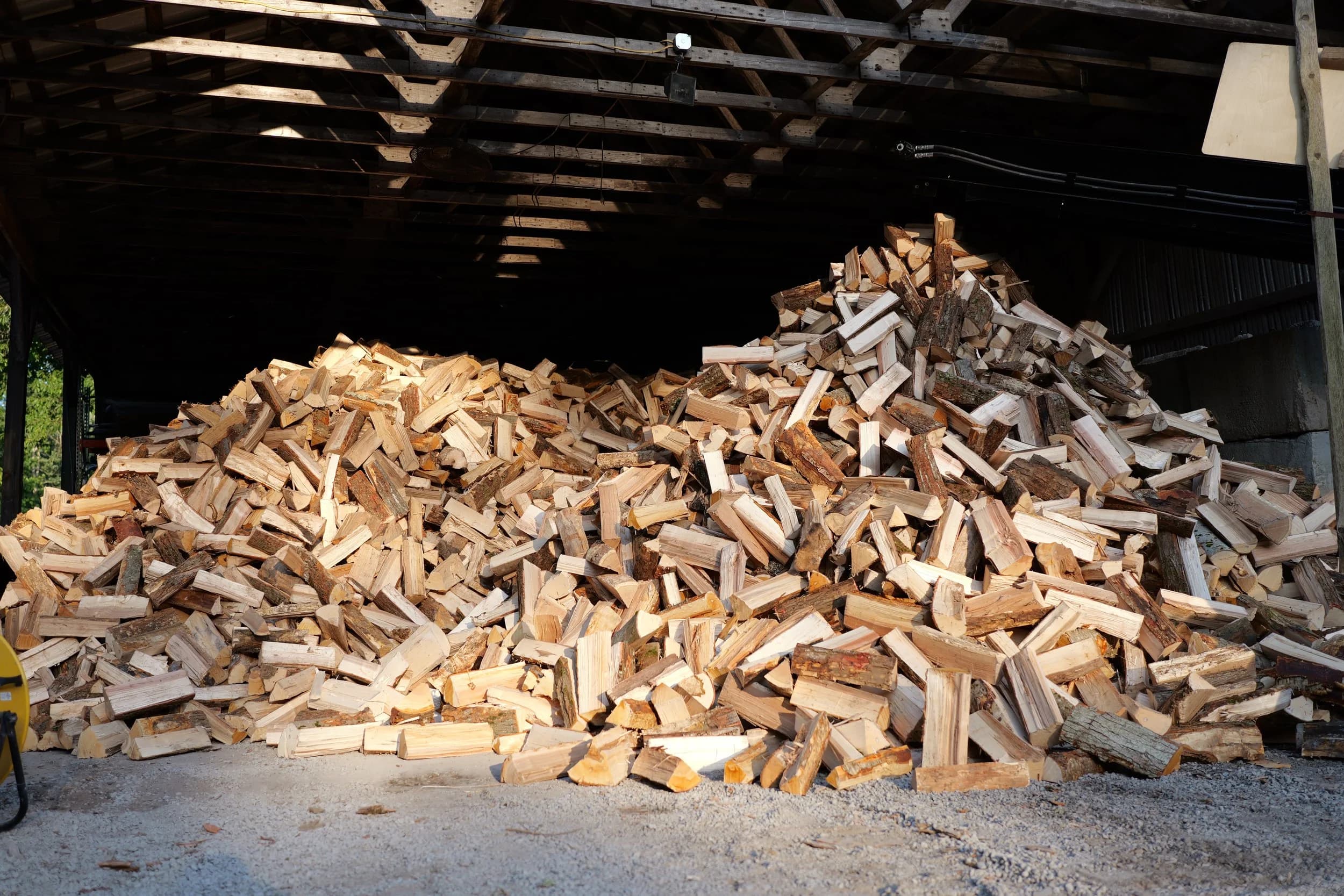 Split and stacked hardwood firewood